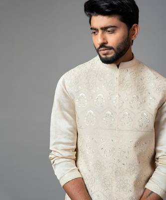 Cream Kora fully embroidered nehru. 2