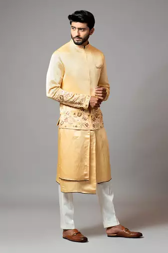Mustard Nehru jacket highlighted with placement floral embroidery.