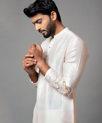 Plain Kurta With Minimal Floral Embroidery On Sleeves 4