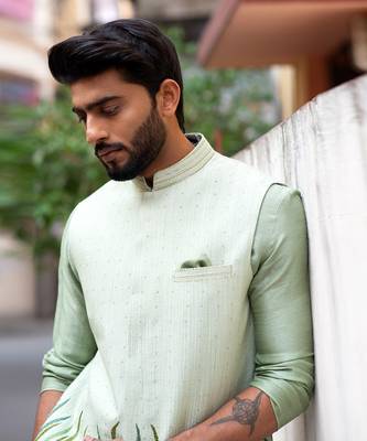 Stitchlines and embroidered nehru with assymetric kurta 5
