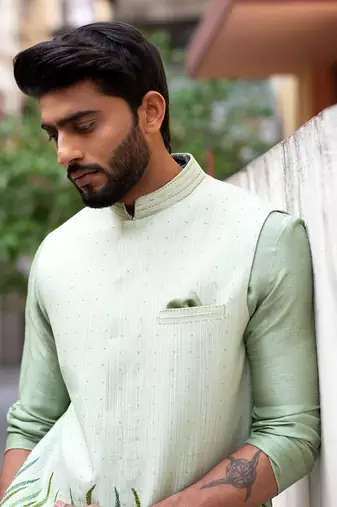 Stitchlines and embroidered nehru with assymetric kurta
