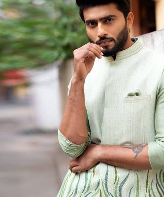 Stitchlines and embroidered nehru with assymetric kurta 6
