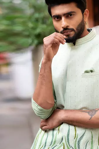Stitchlines and embroidered nehru with assymetric kurta