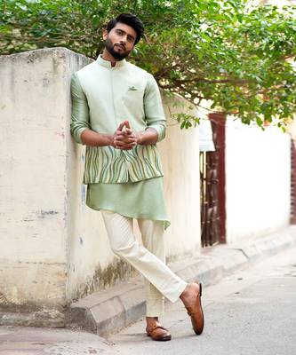 Stitchlines and embroidered nehru with assymetric kurta 7