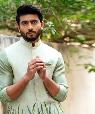 Stitchlines and embroidered nehru with assymetric kurta 8