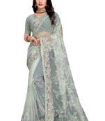 Light green embroidered net saree with blouse