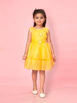 Yellow plain net kids-frocks 1