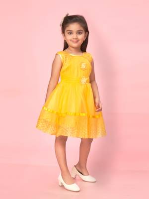 Yellow plain net kids-frocks 2