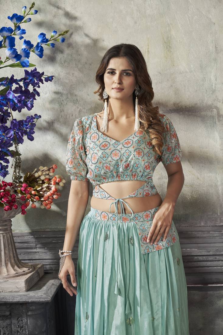 SEA GREEN THREAD AND SEQUINS EMBROIDERED WITH PRINT WORK ART SILK FESTIVE & PARTY WEAR STITCHED LEHENGA