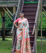Cream woven banarasi silk saree with blouse