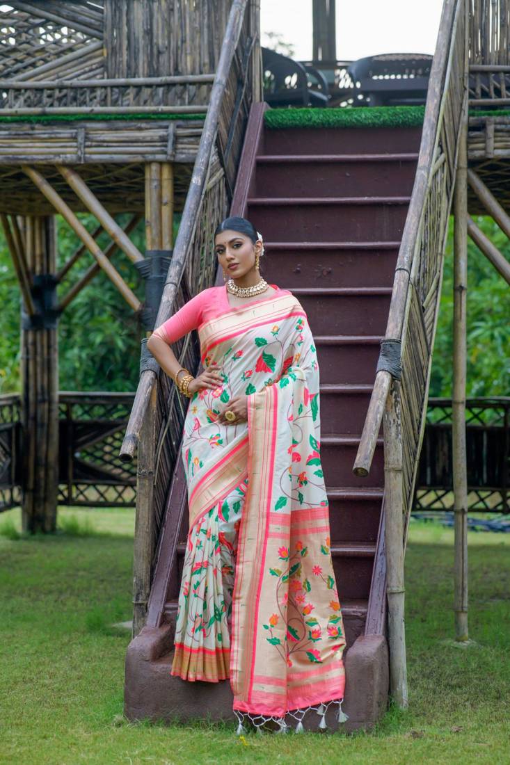 Cream woven banarasi silk saree with blouse