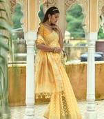 Yellow woven organza saree with blouse