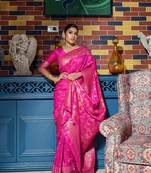 Pink woven banarasi silk saree with blouse