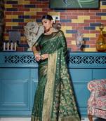 Green woven banarasi silk saree with blouse