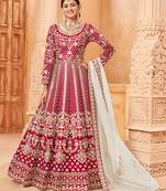Rani-pink embroidered art silk salwar kameez