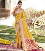 Yellow woven Banarasi silk blend saree with blouse