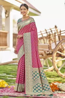 Pink woven Banarasi silk blend saree with blouse