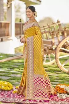 Yellow woven Banarasi silk blend saree with blouse