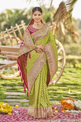 Green woven Banarasi silk blend saree with blouse 1