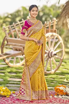 Yellow woven Banarasi silk blend saree with blouse