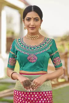 Pink woven Banarasi silk blend saree with blouse
