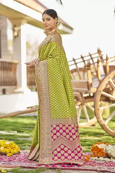 Green woven Banarasi silk blend saree with blouse