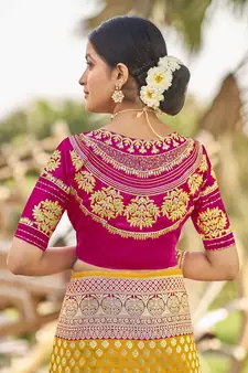 Yellow woven Banarasi silk blend saree with blouse