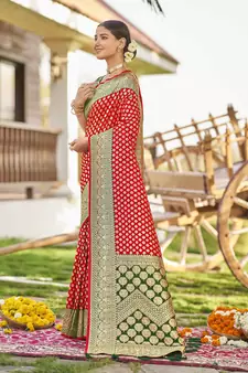 Red woven Banarasi silk blend saree with blouse