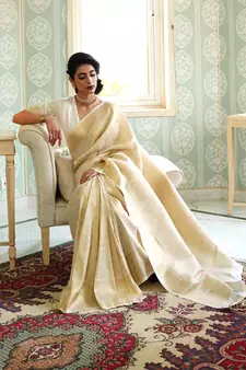 Cream Kumbhi silk bland Kanjivaram style festive wear zari border saree with Blouse