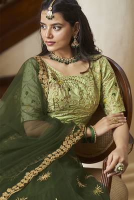 Green  embroidered net semi stitched lehenga 4