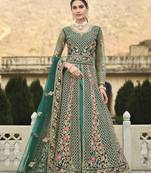 GREEN DESIGNER HEAVY WEDDING PARTY WEAR LONG SALWAR SUIT IN NET FABRIC WITH EMBROIDERY AND STONE WORK SEMI STITCHED