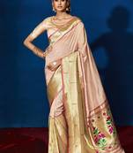 Light pink woven pure silk saree with blouse