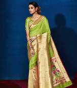 Light green woven pure silk saree with blouse