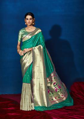 Sea green woven pure silk saree with blouse 1