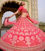Crimson Lehenga With A  Blouse And Dupatta And Veil
