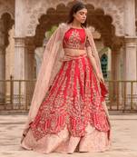 Red Lehenga With A  Blouse And Dupatta And Veil
