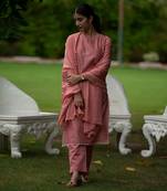 Peach coloured Zari Line Silk kurta set with Cutwork on Border & Embroidered Cutworked Dupatta