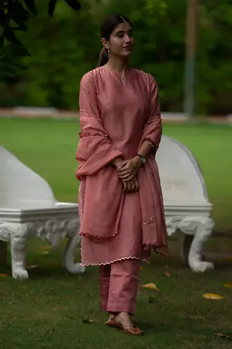 Peach coloured Zari Line Silk kurta set with Cutwork on Border & Embroidered Cutworked Dupatta