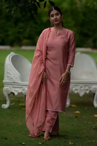 Peach coloured Zari Line Silk kurta set with Cutwork on Border & Embroidered Cutworked Dupatta