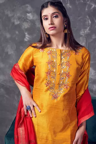 Mustard coloured khadi raw khadi silk kurta set with heavy zardoji handwork