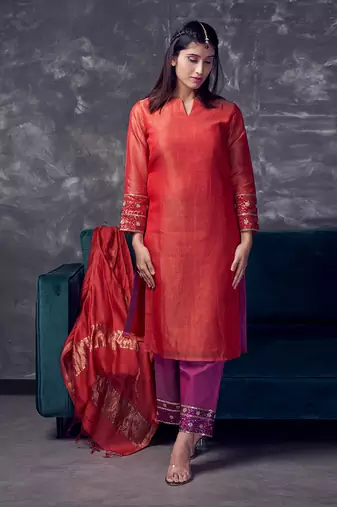 Red coloured chanderi tissue kurta & magenta coloured silk pant & dupatta with heavy sequense embroidery