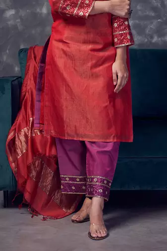 Red coloured chanderi tissue kurta & magenta coloured silk pant & dupatta with heavy sequense embroidery