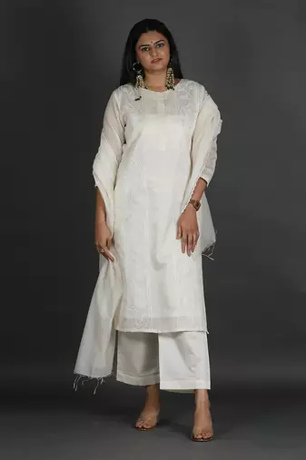 white coloured chanderi silk set & dupatta with heavy dori embroidery on kurta