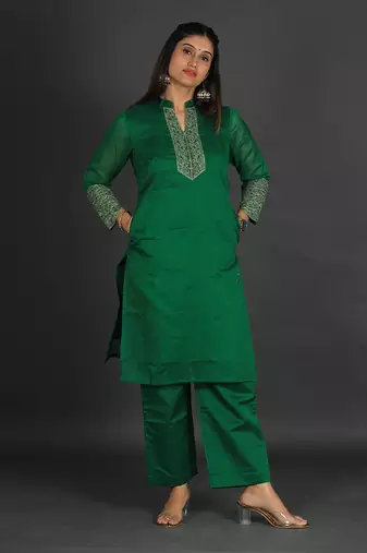 Green coloured chanderi silk set & dupatta with heavy beads & resham work