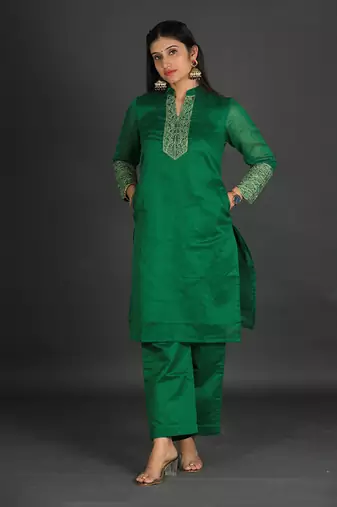 Green coloured chanderi silk set & dupatta with heavy beads & resham work