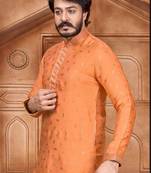 Orange color Self Design jacquard cotton kurta with payjama