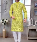 Yellow color pure silk Printed with Self Design kurta with payjama