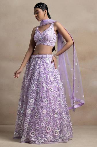 Astonishing Lavender Sequins Embroidered Soft Net Bridal Lehenga