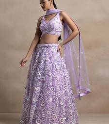Astonishing Lavender Sequins Embroidered Soft Net Bridal Lehenga
