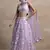 Astonishing Lavender Sequins Embroidered Soft Net Bridal Lehenga